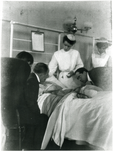 William Osler, MD, with a patient.