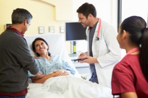 Doctor and Nurse with 2 Patients