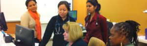 The author's team discusses outpatient handoffs. Photo by the author.