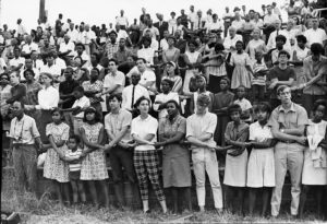 A crowd organized by the Student Non-Violent Coordinating Committee sang “We Shall Overcome” in Farmville, Virginia, in 1966, after a speech by Stokely Carmichael.