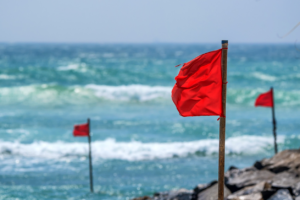red beach warning flags