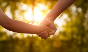 mother and child holding hands