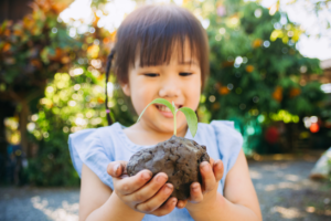girl planting tree