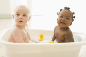 2 babies in the bathtub