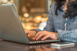 woman working from home on computer