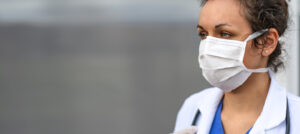 Doctor wearing protection face mask.