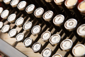 vintage typewriter keyboard close up - concept for writing, journalism, blogging