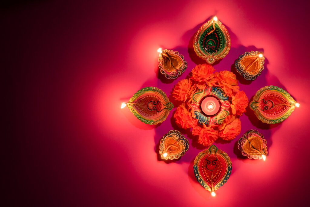 Happy Diwali Clay Diya lamps lit during Dipavali, Hindu festival of