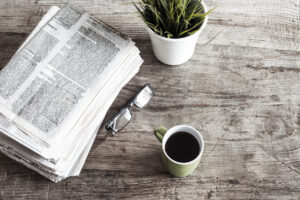 Newspaper on wooden table