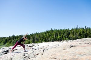 woman doing yoga outside