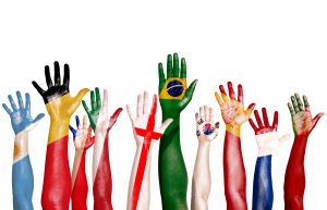 Multi-National Flags Drawn on Raised Hands