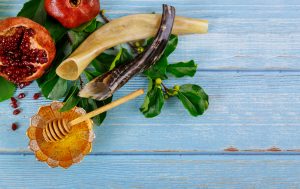Background with traditional food for Yom Kippur jewish holiday.