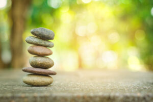 Banlance stone with spa on abstract bokeh background