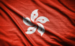 Realistic flag of hongkong on the wavy surface of fabric