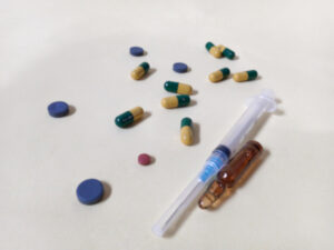 defocused drugs, syringes and other drugs