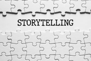 The word storytelling between the jigsaw puzzle pieces.
