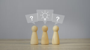 Question mark and light bulb idea in text box, What is your reason concept. Business answer and analysis, problem ask, interrogation, Leader brainstorming with copy space on grey background.