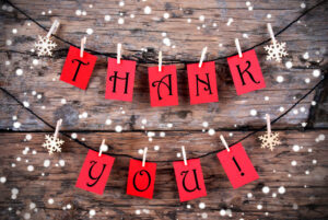 Thank You on Red Tags Hanging on a Line in the Snow