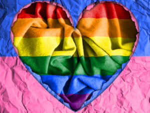 Illustration for lgbt pride, with a shape of a heart and lgbt flag in the