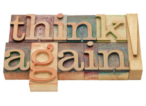 think again exclamation - isolated text in vintage wood letterpress printing blocks
