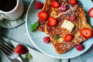 Homemade French toast with Brioche bread topped with berries