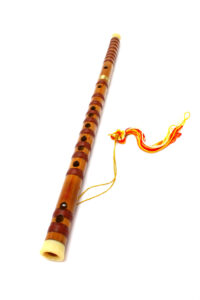 A dizi (Chinese transverse flute) on white background.