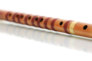 A dizi (Chinese transverse flute) isolated on white background.