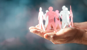 Paper chain friends, teamwork, diversity, family or business community, hand holding and protecting