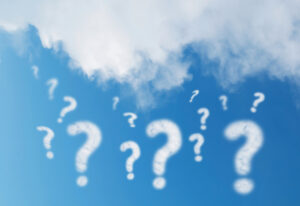 Question mark cloud on blue sky