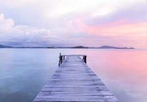 Old wooden dock at the lake, sunset shot