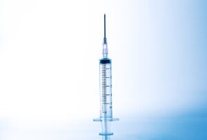 Syringe isolated on white background,Glass syringe isolated on a white background, Clipping Path no shadow. Suitable for creative graphic design