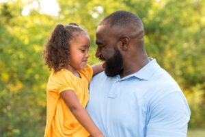 Family having fun playing outside.