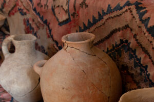 Cultural heritage of Azerbaijan. Antique cracked clay pot. Old handmade pots