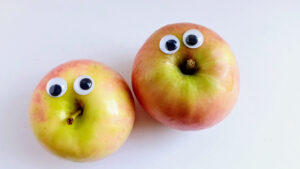 Two apples with plastic eyes funny apples.
