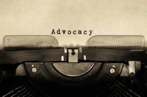 Word typed on vintage typewriter retro style.