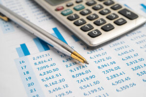 Stethoscope on chart or graph paper, Financial, account, statistics and business data medical health.